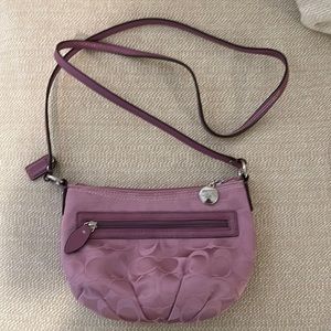 Signature Coach Canvas Crossbody Bag. Wisteria. Size 6” x 9”. 2 zipper pockets
